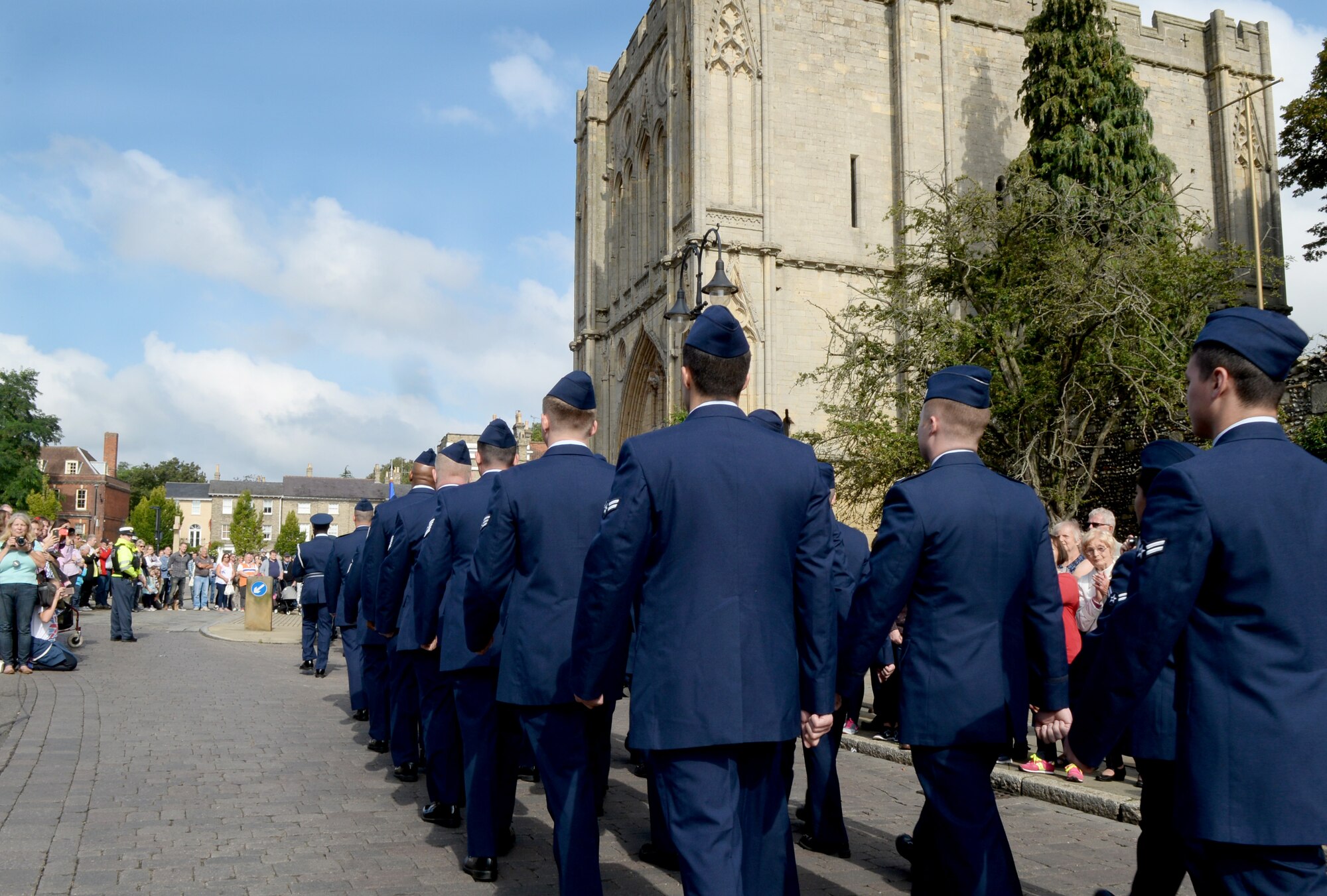 A flight of U.S. Air Force Airmen march along the road during the Battle of Britain parade Sept. 19, 2016, in Bury St. Edmunds, England. The Battle of Britain is a historical event that occurred during World War II during which the Royal Air Force defended the U.K. against the German air force.  (U.S. Air Force photo by Airman 1st Class Tenley Long)