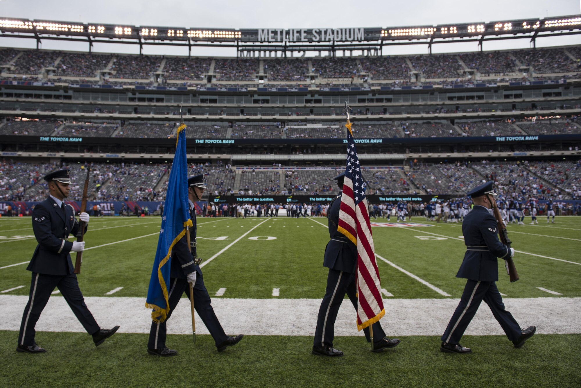 Joint Base McGuire-Dix-Lakehurst Air Force Honor Guards Airman 1st Class Edgar Rodriguez Albelo, Senior Airman James Balser, Master Sgt. Toby Lewis and Airman 1st Class Kendall Morris proceed with the Colors shortly before the Star Spangled Banner at the New York Giants’ game at the Metlife Stadium in East Rutherford, N.J., Sept. 18, 2016. The New York Giants won the game 16 to 13. 
