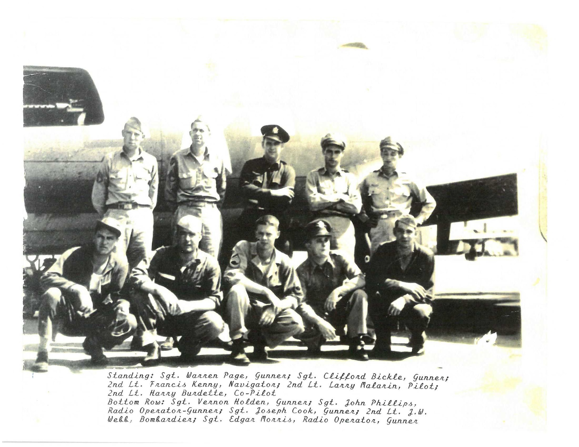 2nd Lt. Harry Burdette(top right), 379th Bombardment B-17 Flying Fortress pilot, shown here with his crew at Kimbolton, England, is the grandfather of Capt. Shawn Jensen, a E-8C Joint Surveillance Target Attack Radar System pilot with the 763rd Expeditionary Reconnaisance Squadron. His grandfatherarrived at Kimbolton in Sept. 1943 and was shot down in late Nov. during a mission over Germany.  He became a prisoner of war for the next 18 months. (Courtesy photo/Richard Burdette/Released)
