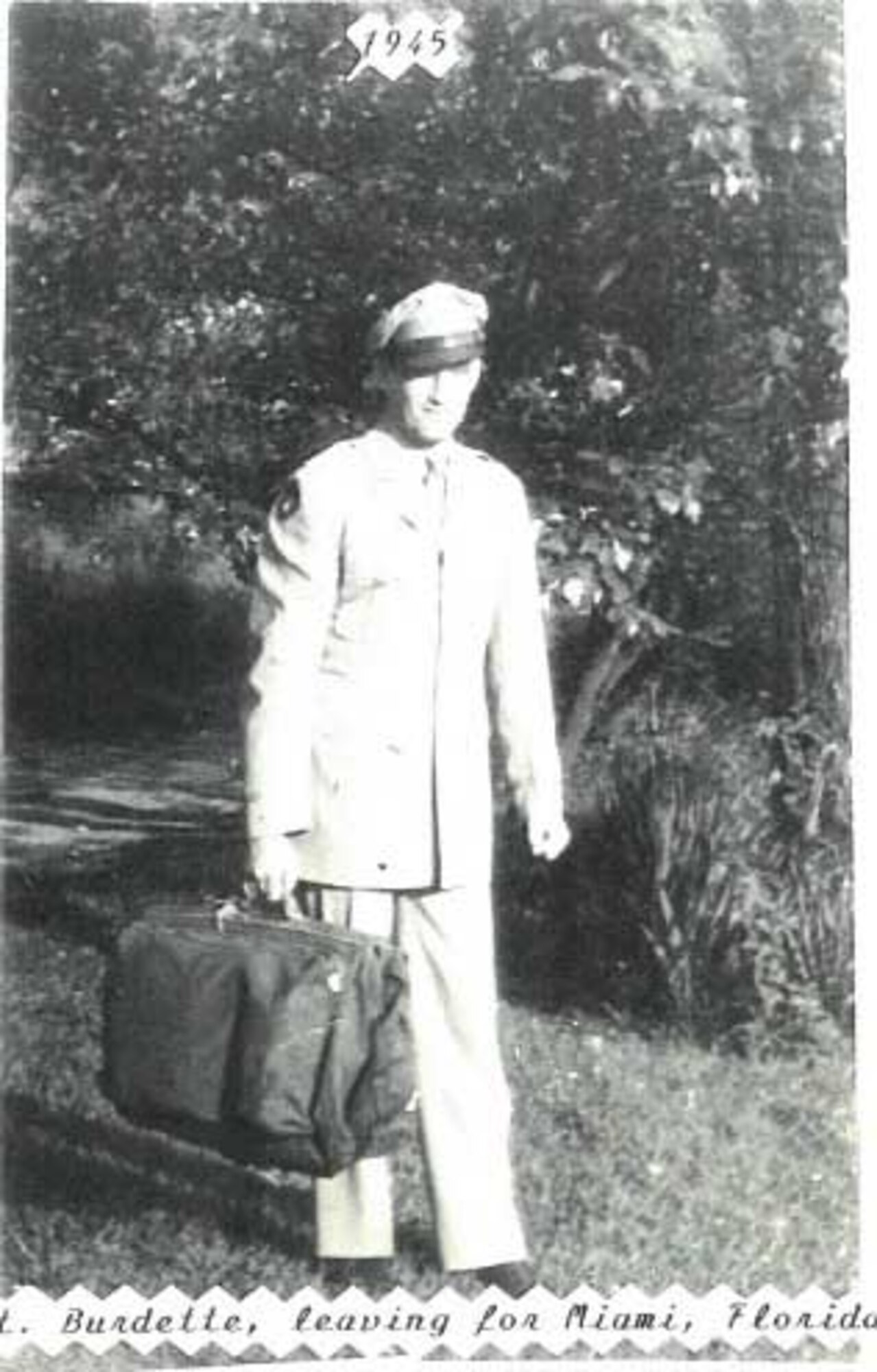 Suitcase in hand, 2nd Lt. Harry Burdette was enroute to Miami for mandatory leave given to prisoners of war. His grandson Capt. Shawn Jensen, a RC-135 Rivet Joint pilot with the 763rd Reconnaissance Wing, refers to his grandfather's diary when he needs a reminder of the sacrifices his grandfather made in captivityas a prisoner of war for 18 months in Nazi Germany. (Courtesy photo/Richard Burdette/Released)