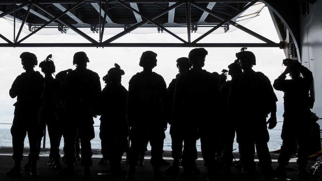 Marines conduct drills aboard USS Bataan to better prepare for tactical recovery of aircraft and personnel missions during Amphibious Squadron Marine Expeditionary Unit Integration Training at sea, Sept. 15 2016. PMINT familiarizes Marines and sailors with amphibious operations and to safely execute embarkation training in preparation for future pre-deployment exercises. The Marines are with Battalion Landing Team, 3rd Battalion, 6th Marine Regiment, 24th Marine Expeditionary Unit. 