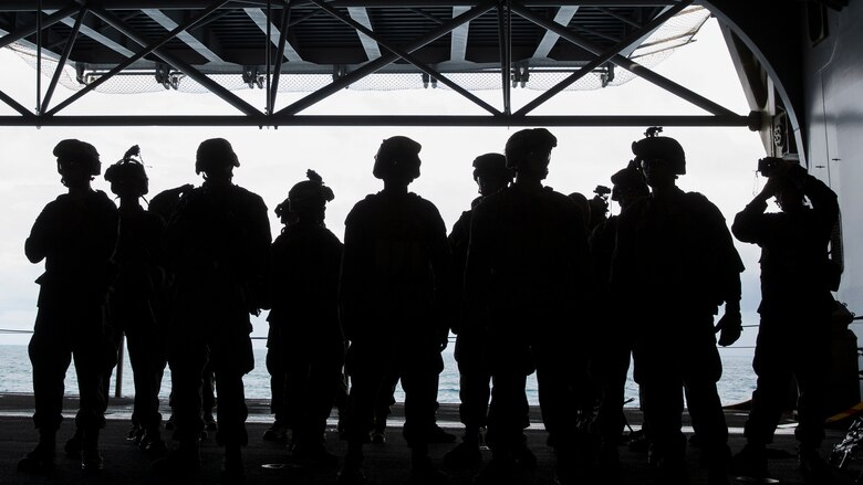 Marines conduct drills aboard USS Bataan to better prepare for tactical recovery of aircraft and personnel missions during Amphibious Squadron Marine Expeditionary Unit Integration Training at sea, Sept. 15 2016. PMINT familiarizes Marines and sailors with amphibious operations and to safely execute embarkation training in preparation for future pre-deployment exercises. The Marines are with Battalion Landing Team, 3rd Battalion, 6th Marine Regiment, 24th Marine Expeditionary Unit. 