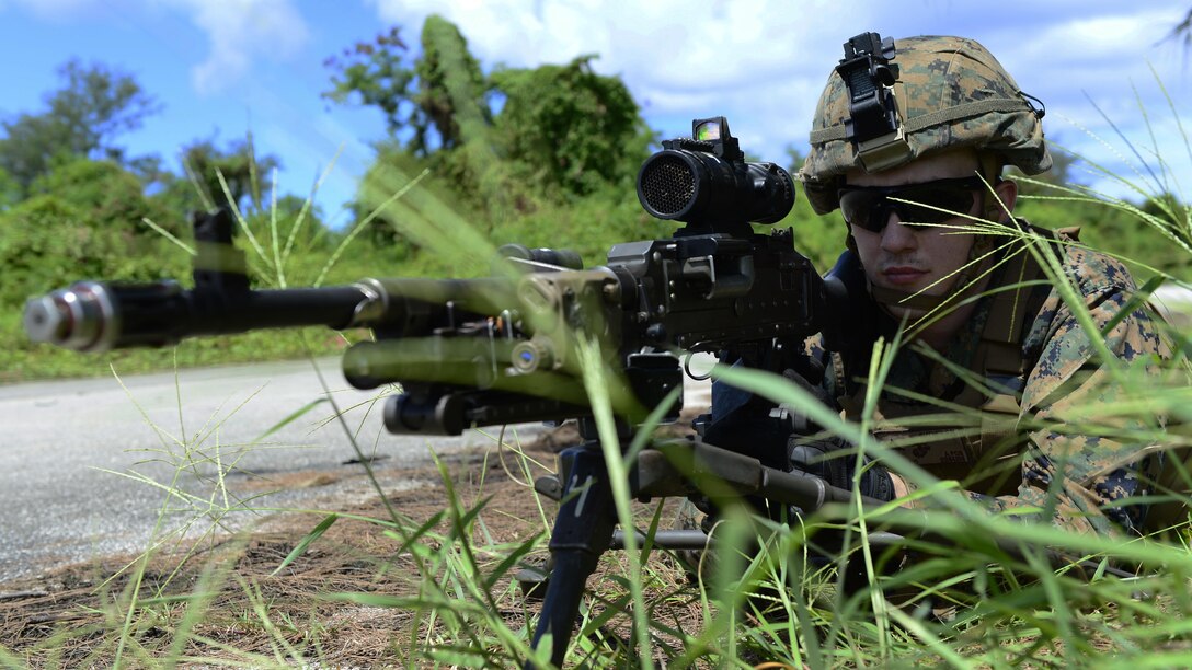Lance Cpl. Patrick Butner, machinegunner with 2nd Battalion, 4th Marine Regiment, attached to 31st Marine Expeditionary Unit, mans an M240B machine gun position while participating in an exercise to secure Orote Airfield on U.S. Naval Base Guam during Exercise Valiant Shield. VS16 is a biennial field exercise with a primary focus on interoperability and integration of joint training among U.S. forces.