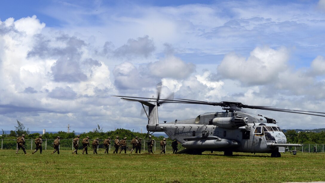 Marines with 2nd Battalion, 4th Marine Regiment, attached to 31st Marine Expeditionary Unit, board a Sikorsky CH-53E Super Stallion, assigned to Marine Medium Tiltrotor Squadron 262 (reinforced), after participating in an exercise to secure Orote Airfield on U.S. Naval Base Guam during Exercise Valiant Shield . VS16 is a biennial field exercise with a primary focus on interoperability and integration of joint training among U.S. forces.