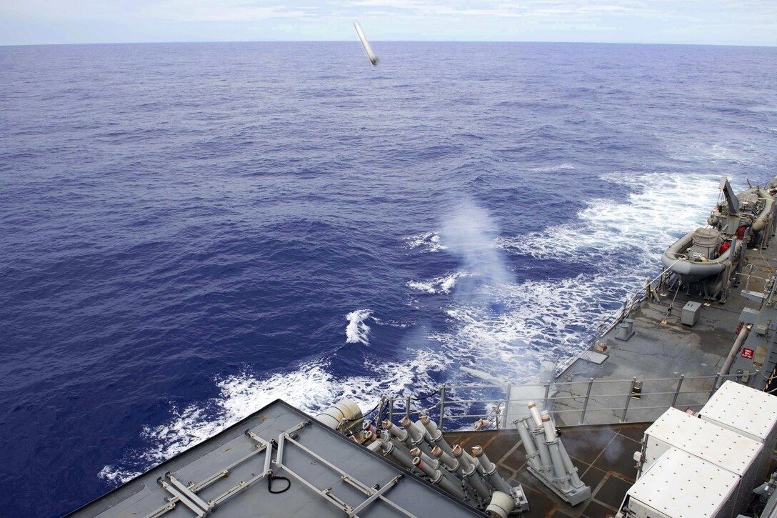 The guided-missile destroyer USS Benfold launches chaff as part of Valiant Shield 2016, an exercise in the Philippine Sea, Sept. 15, 2016. The Benfold is supporting security and stability in the Indo-Asia-Pacific region. Navy photo by Petty Officer 3rd Class Deven Leigh Ellis