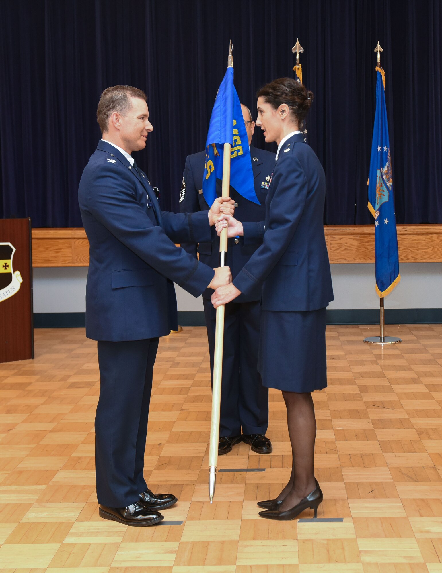Lt. Col. Emily D. Dierhka relinquishes command of the 940th Force Support Squadron to Col. Roderick T. Grunwald, 940th Mission Support Group commander at a change of command ceremony Sept. 10, 2016, at Beale Air Force Base, California. Lt. Col. Dierhka served as the 940 FSS commander for almost five years. (U.S. Air Force photo by Staff Sgt. Brenda Davis)