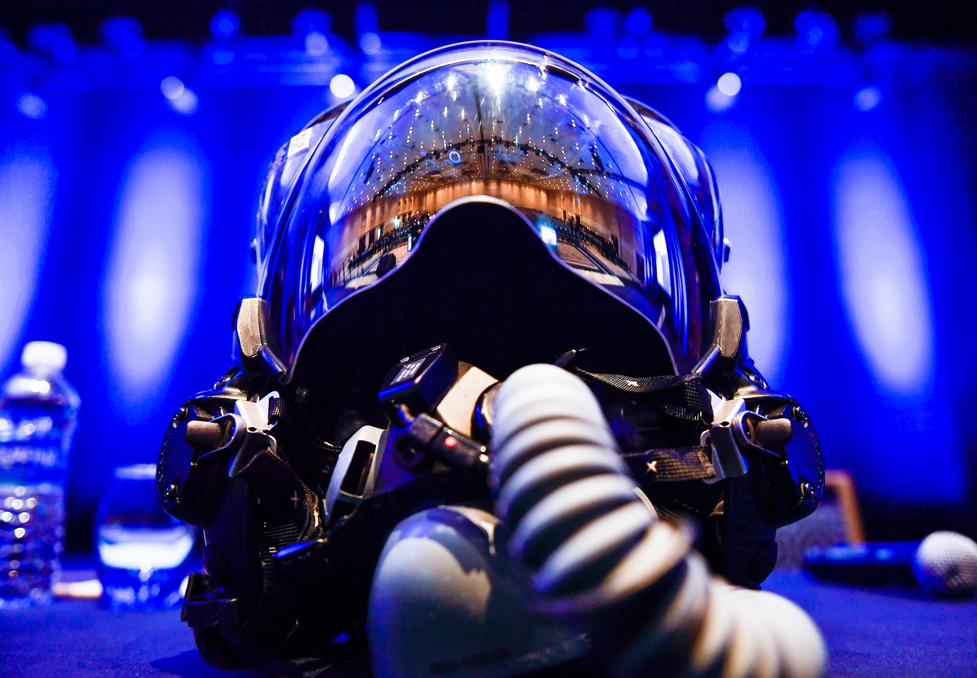 An F-35 Lightning II helmet sits on stage during the F-35 reaching initial operational capability panel discussion during the Air Force Association's Air, Space and Cyber Conference in National Harbor, Md., Sept. 20, 2016.  The F-35’s helmet mounted display system is the most advanced system of its kind. All the intelligence and targeting information an F-35 pilot needs to complete the mission is displayed on the helmet’s visor. (U.S. Air Force photo/Tech. Sgt. Anthony Nelson Jr.)