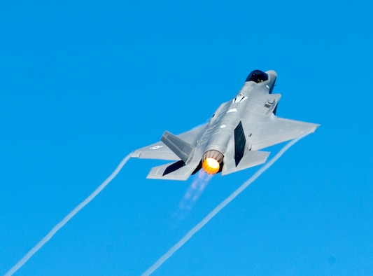 An F-35 Lightning II demonstration aircraft takes off during the AirPower over Hampton Roads Open House at Joint Base Langley-Eustis, Va., April 24, 2016. The aircraft performed alongside and F-22 Raptor and a P-51 Mustang as part of the Heritage Flight Program, which showcases the evolution of airpower by flying today's state-of-the-art fighter aircraft in close formation with vintage fighter aircraft. (U.S. Air Force photo/Senior Airman R. Alex Durbin) 
