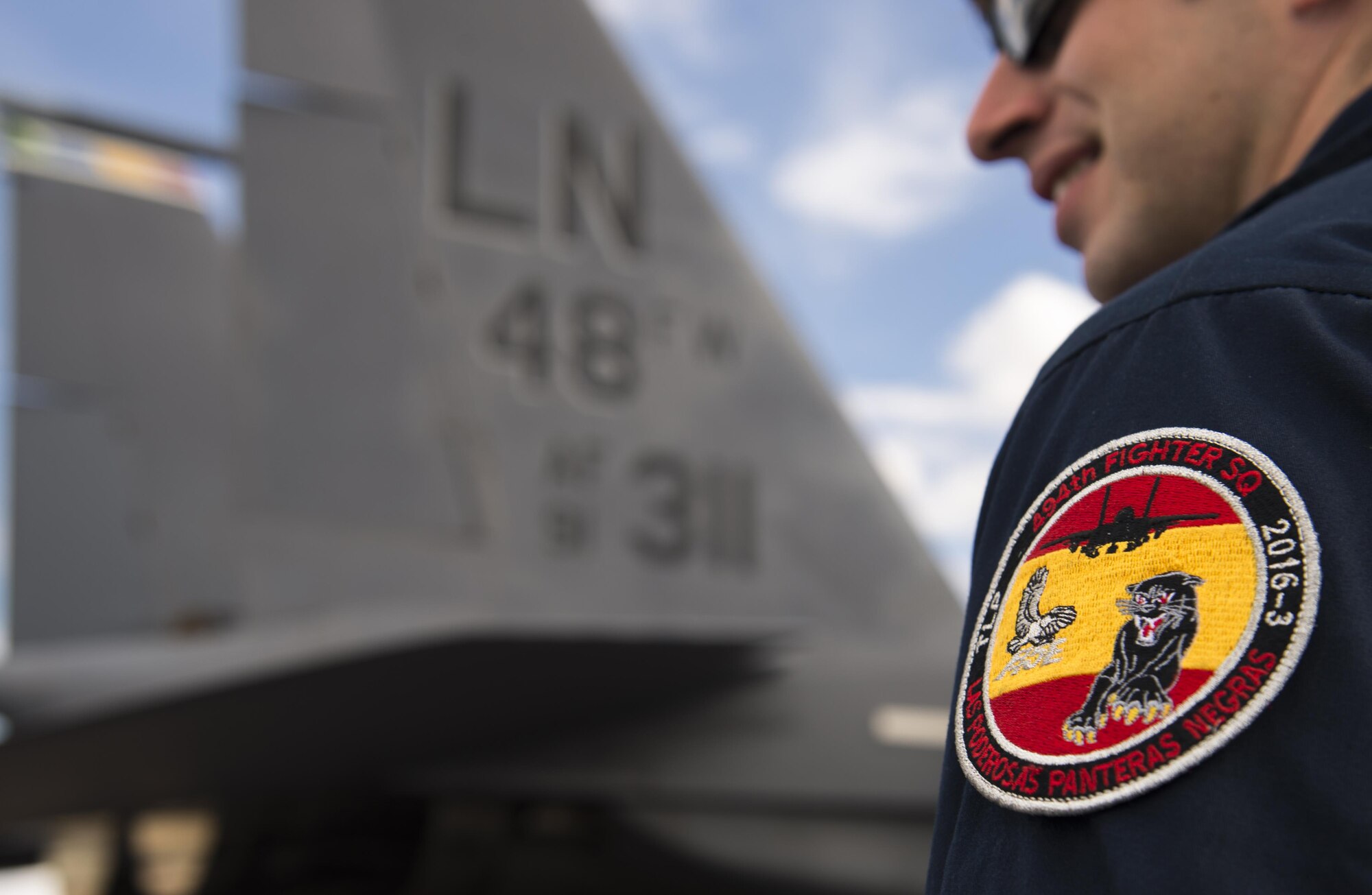Staff Sgt. Andrew Augustine, 48th Aircraft Maintenance Squadron dedicated crew chief, stands by for a sortie in support of Tactical Leadership Programme 16-3 at Los Llanos Air Base, Spain Sept. 15.  The training prepares NATO and allied forces’ flight leaders to be mission commanders, to lead coalition force air strike packages, to instruct allied flying and non-flying personnel in matters related to tactical composite air operations, and to provide tactical air expertise to NATO agencies. (U.S. Air Force photo/ Staff Sgt. Emerson Nuñez)