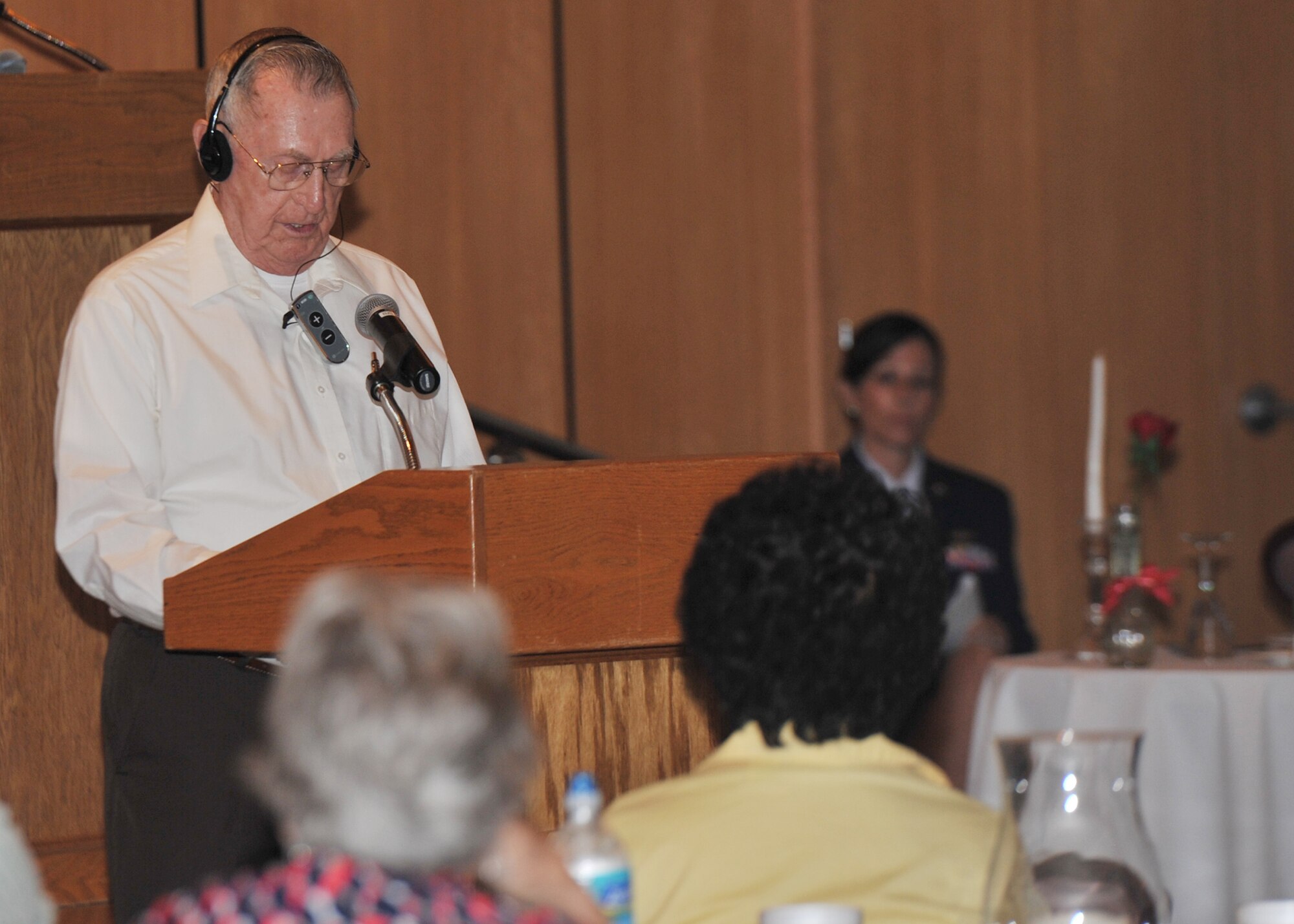 Retired U.S. Air Force Master Sgt. John Milam speaks during the POW/MIA luncheon at the Horizons Community Center on Tyndall AFB, Fla., Sept. 20, 2016. Milam first enlisted into the Air Force as an aerial gunner in 1952. Milam deployed to Vietnam and Cambodia, where he completed more than 75 aerial missions. (U.S. Air Force photo by Senior Airman Ty-Rico Lea/Released)