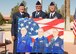Three generations of U.S. Air Force master sergeants are represented in a painting and in real life in front of Bldg. 1 Sept. 16. From left: retired Master Sgt. Derrell Willson, retired Master Sgt. Derrell Willson II, and now retired Master Sgt. Derrell Willson III. Willson III retired Sept. 16 ending almost 65 years of continuous service to the U.S. Air Force from the Willsons. (U.S. Air Force photo by Joseph Gocong)