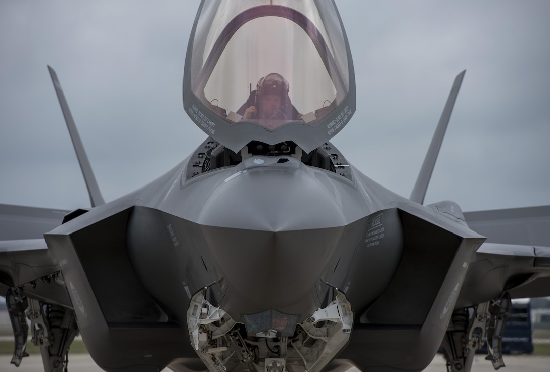 Maj. Will Andreotta, F-35 Lightning II “Heritage Flight Team” pilot from Luke Air Force Base, Az., prepares to exit the cockpit at Joint Base Andrews, Md., Sept. 20, 2016. The aircraft is here to perform a fly-over during the U.S. Air Force Tattoo at Joint Base Anacostia-Bolling, D.C., Sept. 22, 2016. (U.S. Air Force photo by Airman Gabrielle Spalding)