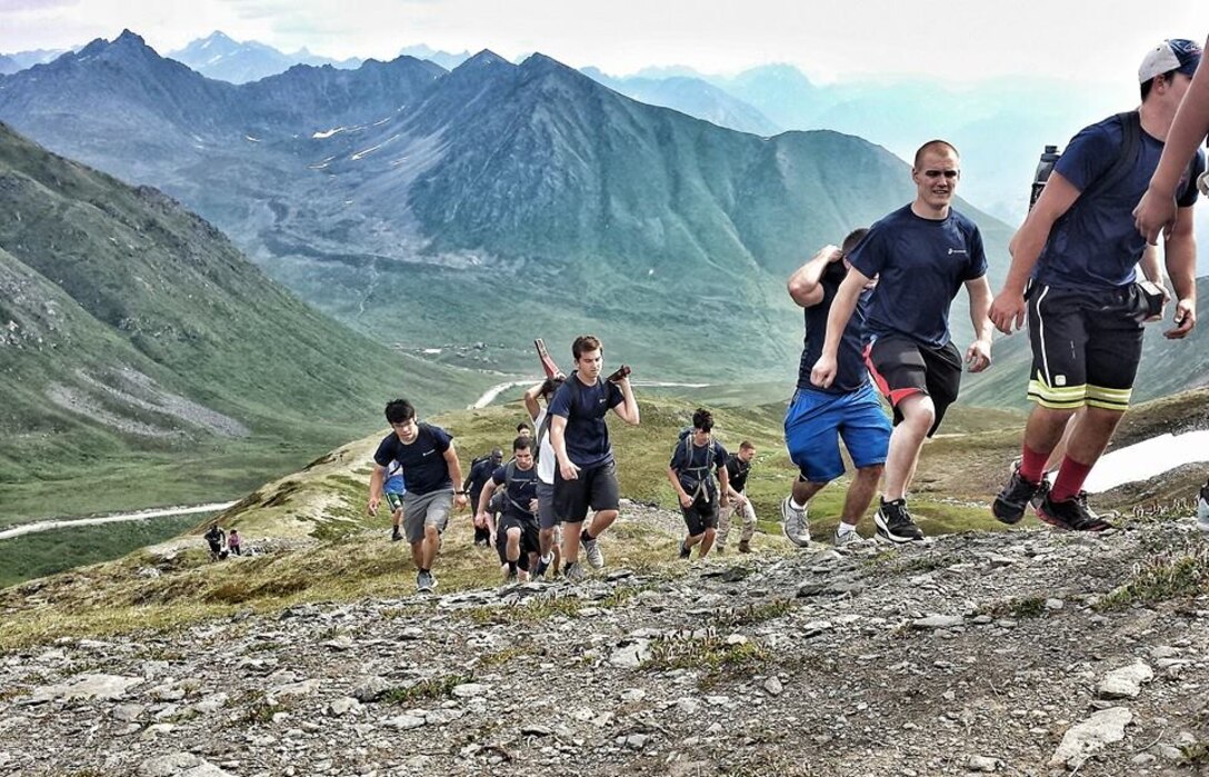 Poolees from RSS Alaska hike Hatcher Pass, a 3,886 foot high mountain in the Talkeetna Mountains, Alaska. The poolees carried pieces of a pull-up bar to assemble it at the peak of the mountain. (Photo courtesy of Marine Corps Recruiting Alaska Facebook page)
