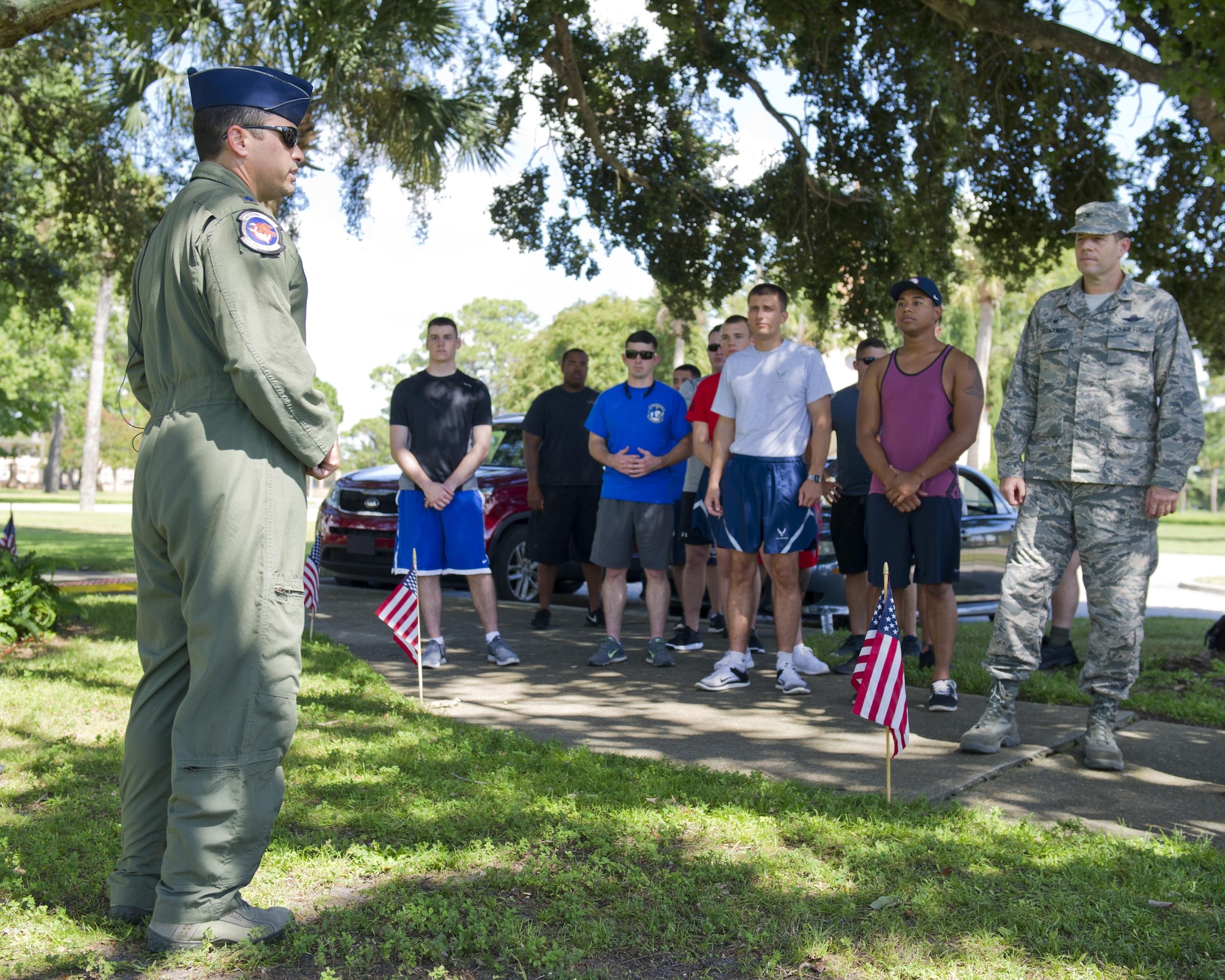 U.S. Air Force Lt. Col. Adam Bright speaks at the Prisoner of War/Missing in Action Memorial 24 Hour Vigil Run at Flag Park, Tyndall Air Force Base, Fla., Sept. 15, 2016. The event marks Tyndall’s 27th POW/MIA 24 hour vigil run, which is hosted by the 81st Range Control Squadron annually. (U.S. Air Force photo by Staff Sgt. Alex Fox Echols III/Released)