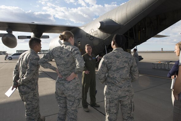 Maj. Jen Remmers, 910th Air Wing aerial spray team pilot, explains their mission of the aerial spray team, September 19, 2016, at Mountain Home Air Force Base, Idaho. A group of individuals from the 366th Civil Engineer Squadron and the Aerospace Medicine Squadron bioenvironmental flight had the opportunity to tour the C-130 and hear about its capabilities. (U.S. Air Force photo by Senior Airman Malissa Lott/Released)