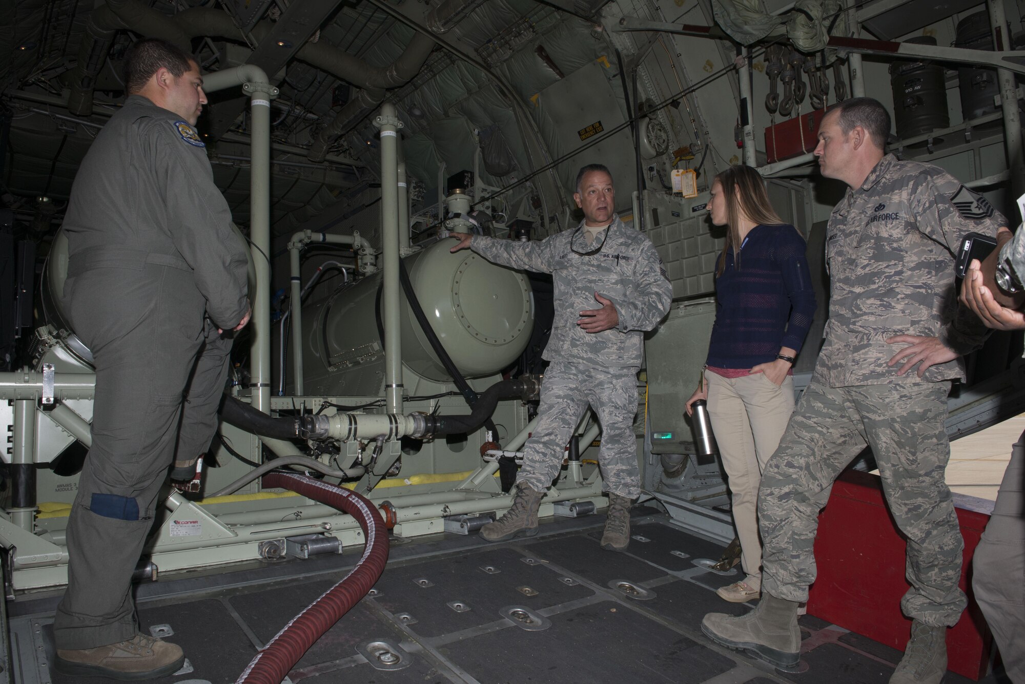 Senior Master Sgt. Philip Aliberti, 910th Maintenance Group spray maintenance superintendent, describes the equipment that’s used during a typical mission Sept. 19, 2016, at Mountain Home Air Force Base, Idaho. While the 910th Air Wing aerial spray team is at Mountain Home AFB, they’ll be conducting sprays over the Saylor Creek and Juniper Butter Range Complexes to prevent the spread of invasive plant species. (U.S. Air Force photo by Senior Airman Malissa Lott/Released)