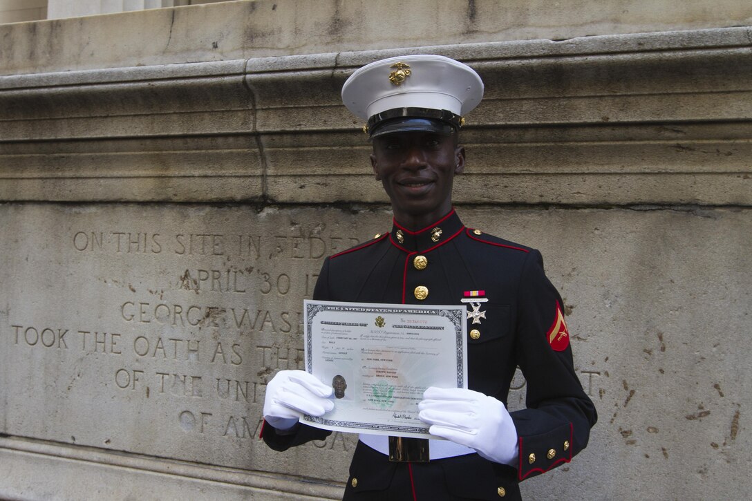 Lance Cpl. Torffic Hassan, a Reserve Marine with 6th Communications Battalion, became a naturalized U.S. citizen March 22, 2013, during a Naturalization Ceremony at the Federal Hall National Memorial. Hassan immigrated to the United States in 2009 from the Republic of Ghana, West Africa. (U.S. Marine Corps photo by Cpl. Juan D. Alfonso)