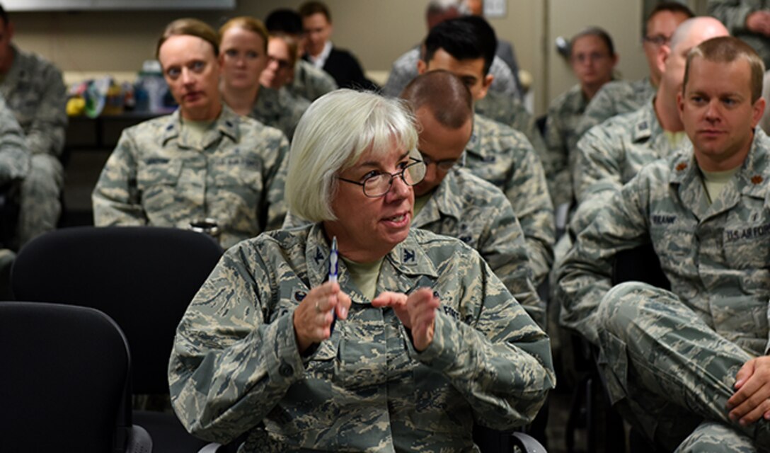 Col. Margaret Carey, 92nd Medical Group commander, asks questions to visiting Military Health System Genesis program officials September 7, 2016, at Fairchild Air Force Base, Wash. Fairchild is the sole Air Force testing site for the MHS Genesis program. (U.S. Air Force photo/Airman 1st Class Ryan Lackey)
