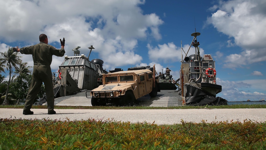 A Humvee off-loads from a landing craft air cushion hovercraft during a mechanized raid as part of Exercise Valiant Shield at the Naval Base Guam Reserve Landing Craft Beach, Sept. 20, 2016. In order to gain operationally significant terrain Battalion Landing Team 2nd Battalion, 4th Marines, stormed the beach for follow on operations as part of island seizure for the exercise. VS16 is a U.S.-only, biennial field training exercise focused on integration of joint training in a blue-water environment among U.S. forces.