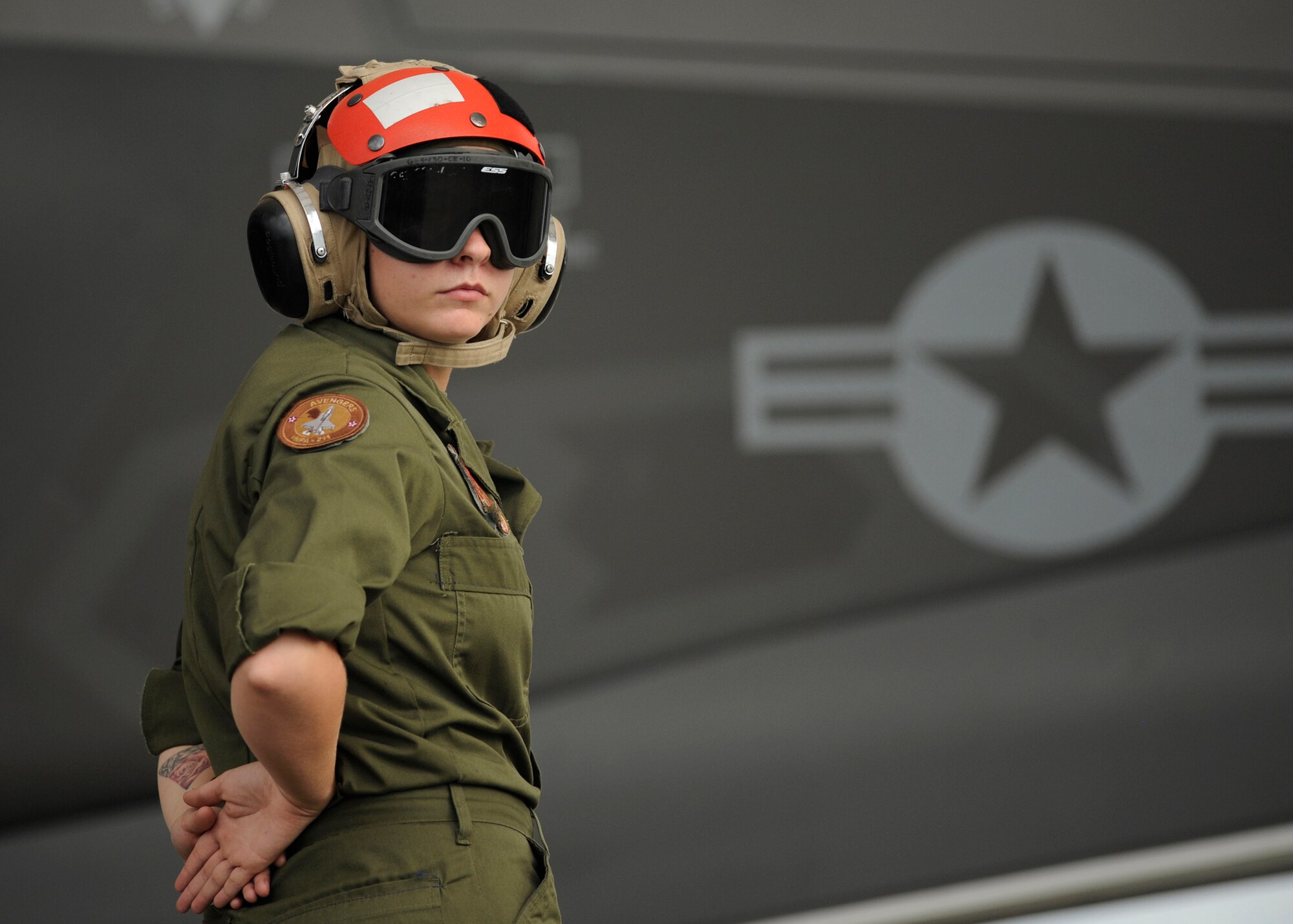 U.S. Marine Lance Cpl. Alexah Atteberry, Marine Fighter Attack Squadron (VMFA) 211 aviation ordnance, prepares to marshal an F-35 Lightning II on the Tyndall fligthline Sept. 16, 2016. Atteberry deployed with VMFA 211 to Tyndall to participate in a 53rd Weapon Evaluation Group Combat Archer training program, where her unit preformed the first operational live fire of the F-35’s air-to-air missile weapons system. (U.S. Air Force photo by Senior Airman Solomon Cook/Released)