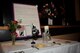 A table set for one stays vacant during a POW/MIA recognition ceremony at the main veteran’s affairs campus R.E. Lindsay Auditorium in Tucson, Ariz., Sept. 16, 2016. The table cloth symbolizes the purity of their intentions, the rose of the families and loved ones who await their return, the red ribbon shows the determination to demand proper accounting for those missing, the lemon is symbolic of the bitterness they faced and the salt represents the tears of their loved ones. Finally the inverted glass and empty chair and to show that they are still missing. (U.S. Air Force photo by Senior Airman Cheyenne A. Powers)