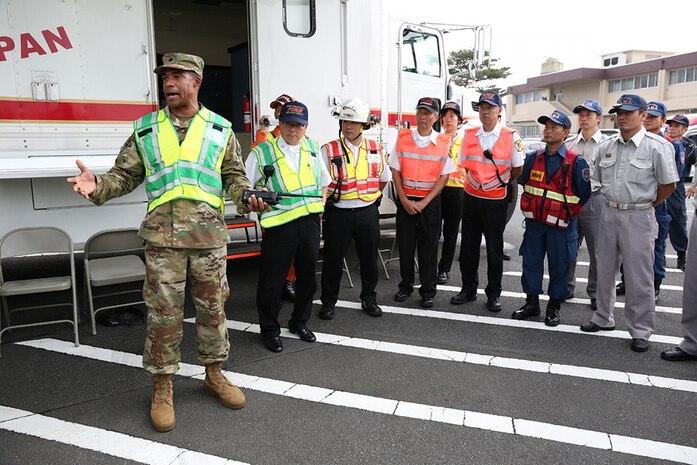Lt. Col Barry Winnegan, director of emergency services for USAG Japan, gives remarks after the active shooter scenario is completed to an audience of Camp Zama and local Japanese first responders during the full-scale exercise held Sept. 12-16 on Camp Zama.