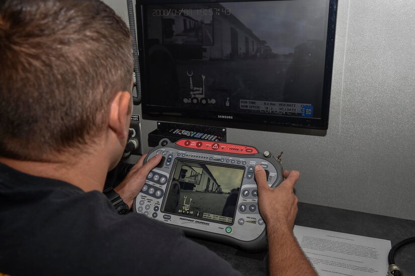 Master Deputy James Thomas, a hazardous device technician with the Charleston County Sheriff's Office, drives a bomb disposal robot during a training scenario at here, Sept. 21, 2016.The remotely operated robot helps ensure the safety of personnel on scene and others in the surrounding area.