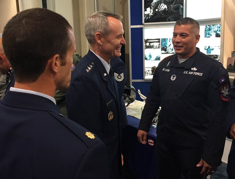 Lt. Gen. Daryl Roberson, commander of Air Education and Training Command talks with AETC Airmen at the 2016 Air, Space and Cyber Conference, National Harbor, Md., Sept. 21, 2016. AETC Airmen from various career fields showcased their capabilities, professionalism and innovation for conference attendees. (U.S. Air Force photo by Senior Airman Chip Pons)