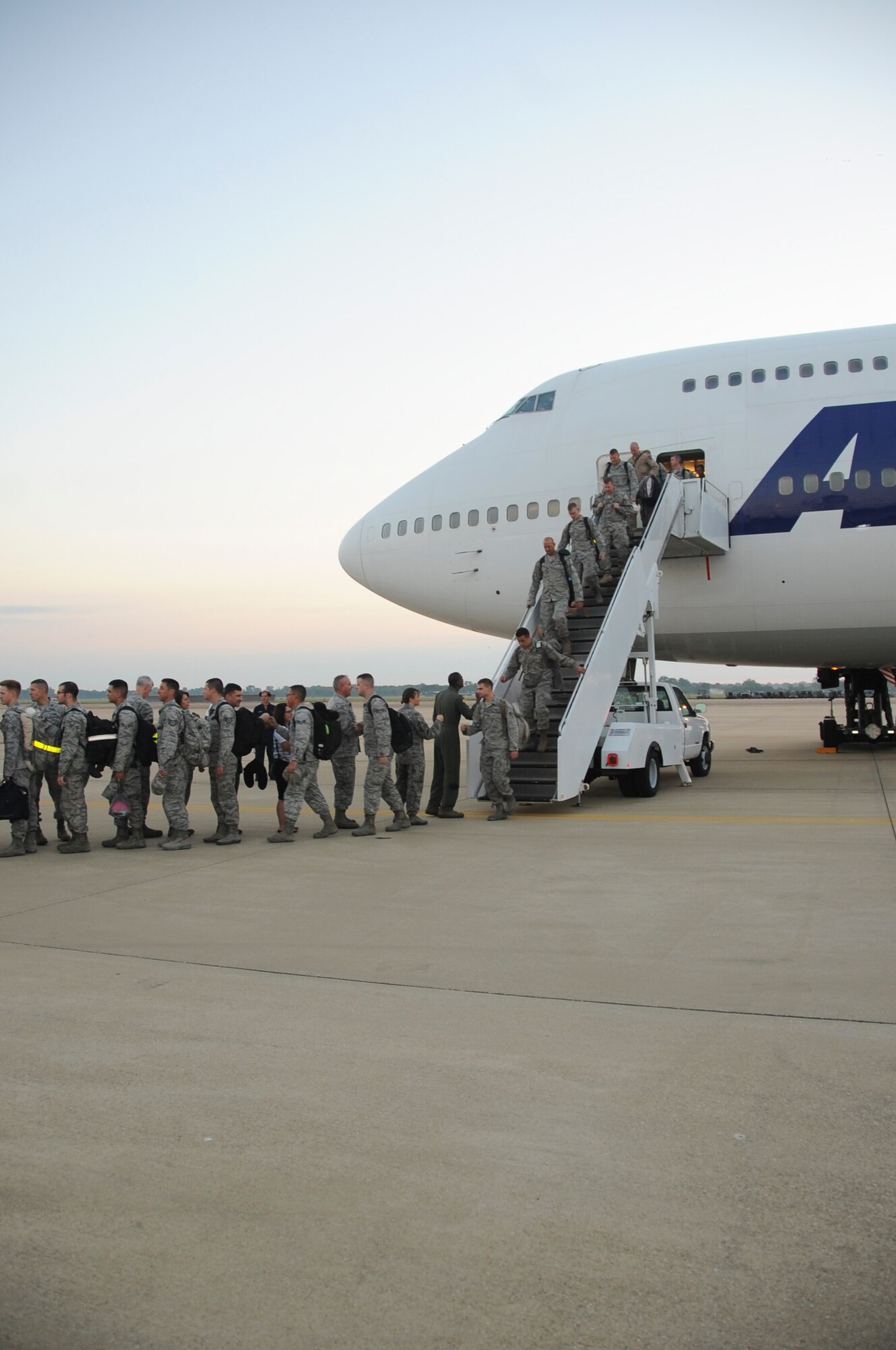 Airmen are welcomed home after being deployed for more than five months and are greeted by base leadership at Barksdale Air Force Base, La., Sept. 19, 2016. The Airmen were deployed to Al Udeid Air Base, Qatar, in support of Operation Inherent Resolve. (U.S. Air Force photo/Airman Alexis C. Schultz)