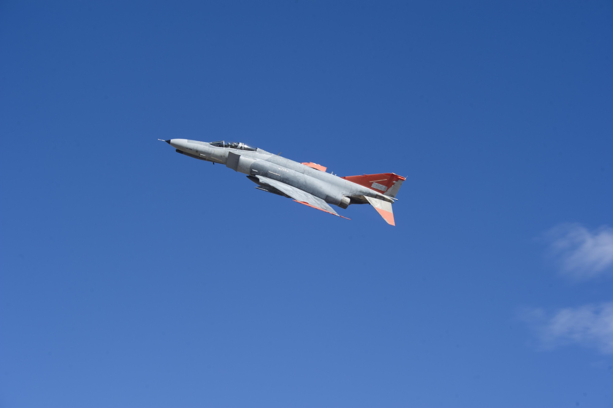 A QF-4 Phantom II departs Holloman Air Force Base, N.M. on Sept. 13, 2016, in front of 160 spectators participating in Holloman’s annual Phantom Society Tour. The tour enabled aircraft enthusiasts, including veterans and non-veterans with aviation backgrounds, to learn more about Holloman AFB’s aircraft and mission. The tour included an F-16 Fighting Falcon static display and briefing, travel to Holloman’s High Speed Test Track, the opportunity to view QF-4 Phantom IIs and F-16s in flight, and a visit to the base’s heritage park to view static displays of various aircraft historically stationed at Holloman AFB. (U.S. Air Force photo by Master Sgt. Matthew McGovern)