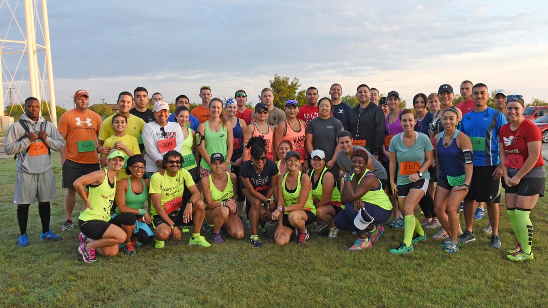 Participants of the Dyess Mini Marathon pose for a photo at Dyess Air Force Base, Texas, Sept. 17, 2016. More than 50 contestants ran in the event in commemoration of the Air Force’s 69th birthday. (U.S. Air Force photo by Senior Airman Kedesha Pennant)


