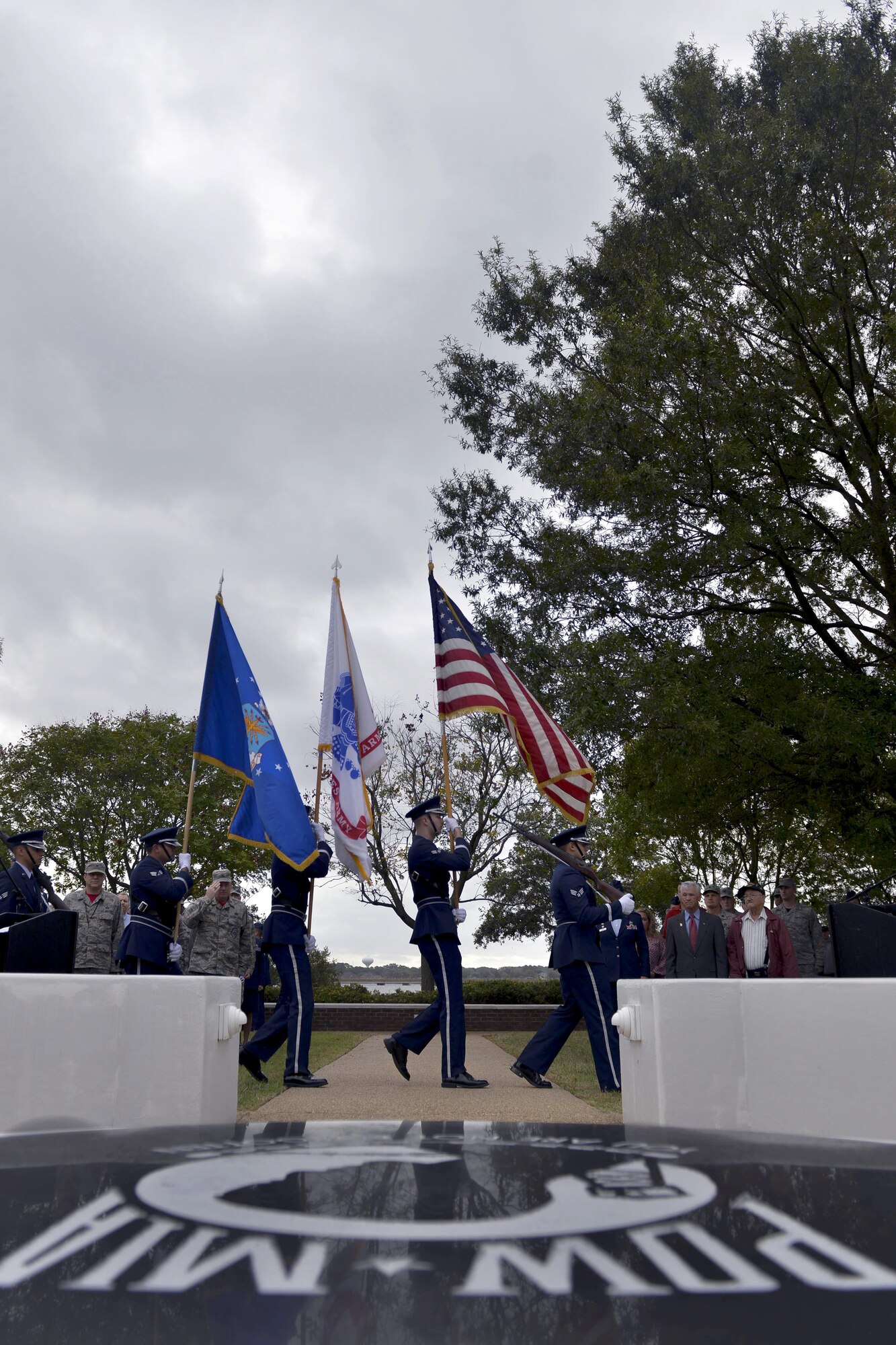 Members of the Joint Base Langley-Eustis honor guard prepare to post the colors during the POW/MIA Recognition Day ceremony at Joint Base Langley-Eustis, Va., Sept. 16, 2016. The flag is raised as a solemn reminder to never forget the sacrifices made to defend the Nation. (U.S. Air Force photo by Staff Sgt. Natasha Stannard) 