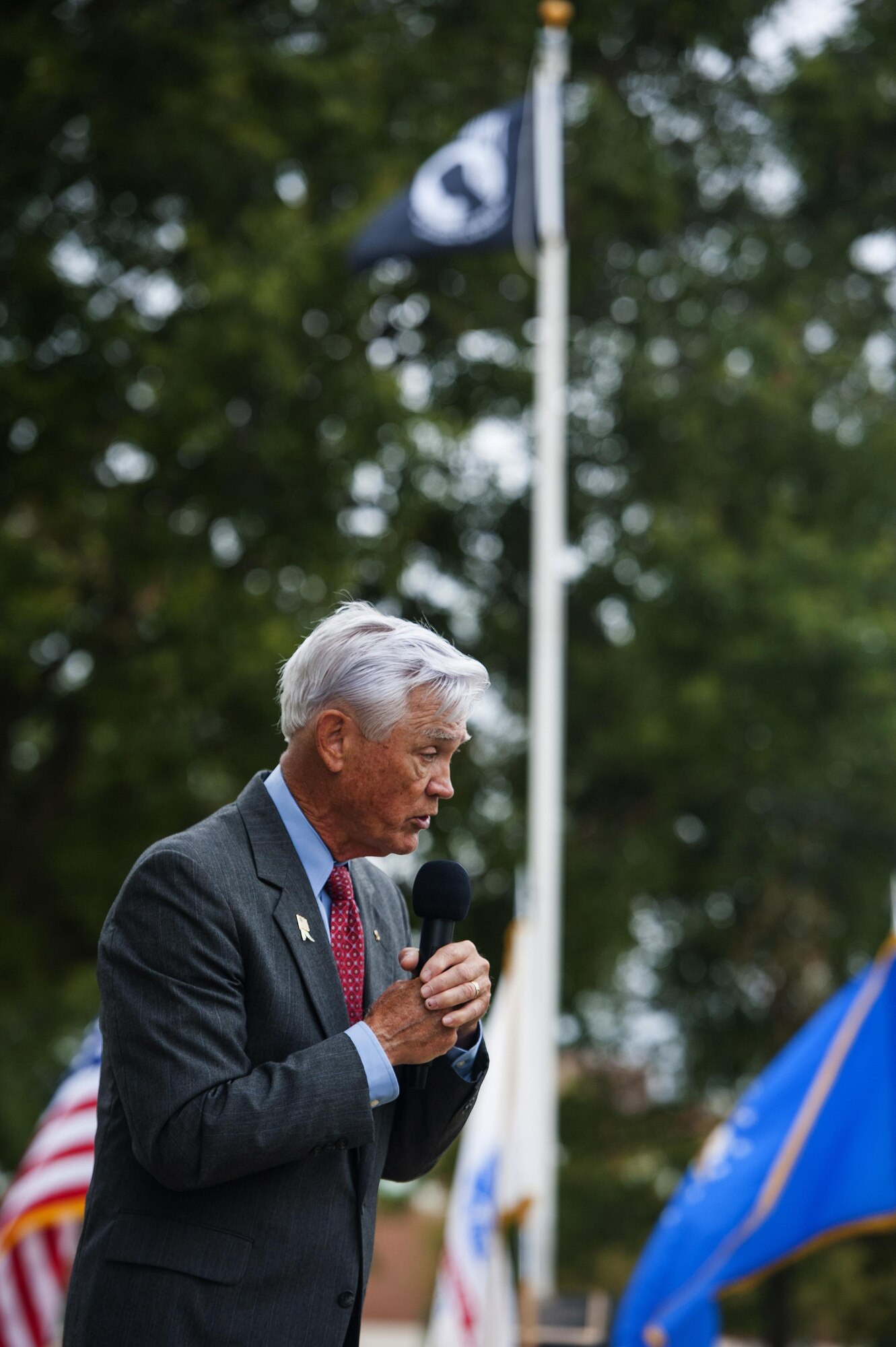 U.S. Air Force Lt. Col. (ret.) Barry Bridger, former 43rd Tactical Fighter Squadron F-4 Phantom aircraft commander, speaks during a Prisoner of War/Missing in Action closing ceremony at Joint Base Langley-Eustis, Va., Sept. 16, 2016. Bridger, who was a POW for six years during the Vietnam War, shared his personal story and spoke of the importance of remembrance. (U.S. Air Force photo by Staff Sgt. Nick Wilson/Released)