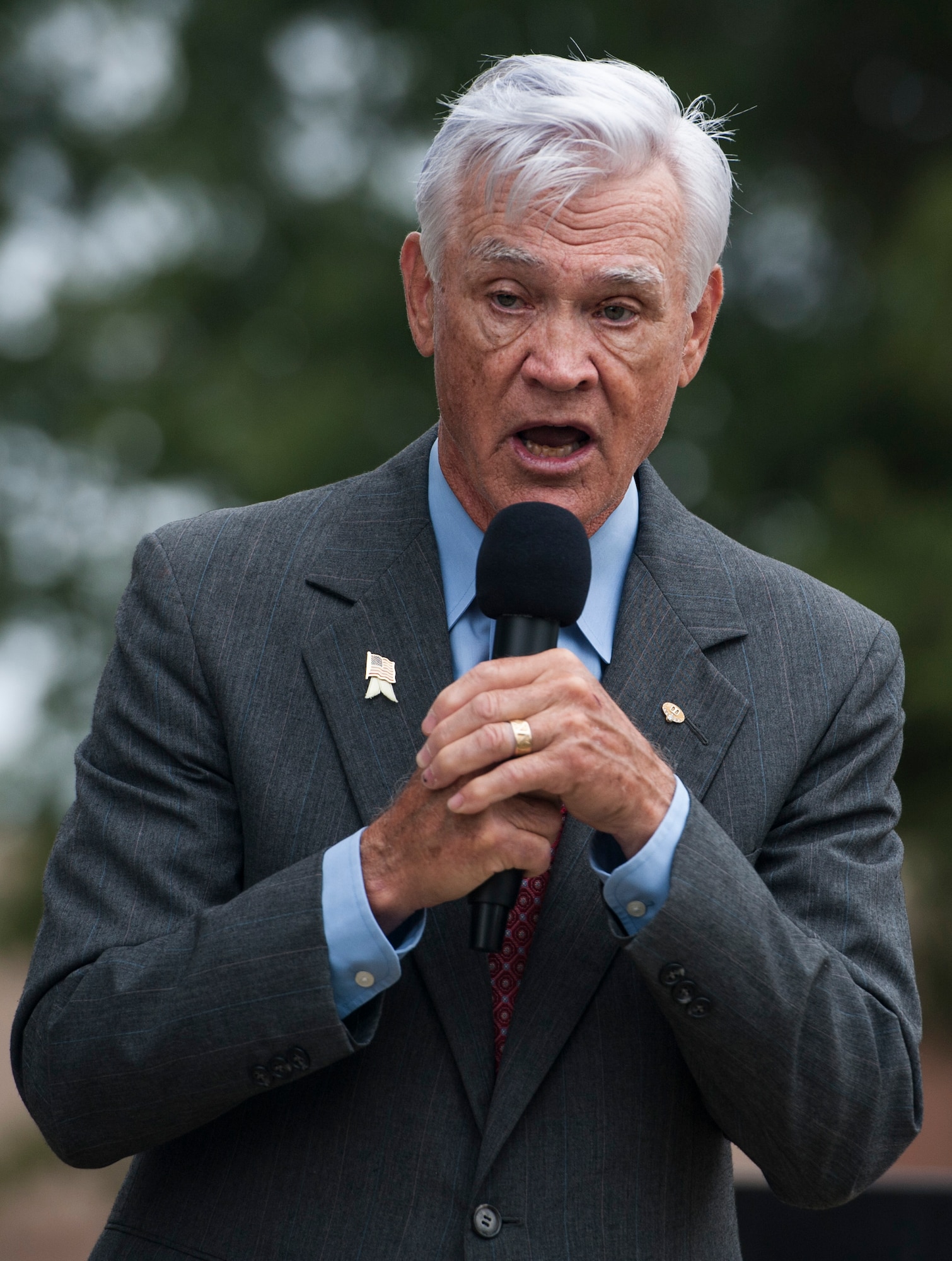 U.S. Air Force Lt. Col. (ret.) Barry Bridger, former 43rd Tactical Fighter Squadron F-4 Phantom aircraft commander, speaks during a Prisoner of War/Missing in Action closing ceremony at Joint Base Langley-Eustis, Va., Sept. 16, 2016. Bridger was shot down during a combat tour with the 497th Fighter Squadron, becoming a prisoner of war on Jan. 23, 1967. He was imprisoned for 2,232 days in the “Hanoi Hilton” camp in North Vietnam. (U.S. Air Force photo by Staff Sgt. Nick Wilson/Released)