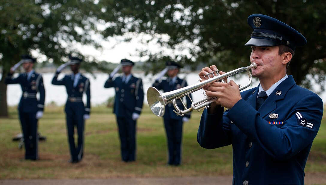 Airman 1st Class Owen Cox, the 633rd Air Base Wing Honor Guard member, plays Taps during a Prisoner of War/Missing in Action closing ceremony at Joint Base Langley-Eustis, Va., Sept. 16, 2016. Taps was created in 1932 by General Daniel Butterfield and is used in connection with military funerals, memorial events and to signify the beginning of the long last sleep at the end of a service member’s life or at the end of the duty day. (U.S. Air Force photo by Staff Sgt. Nick Wilson/Released)