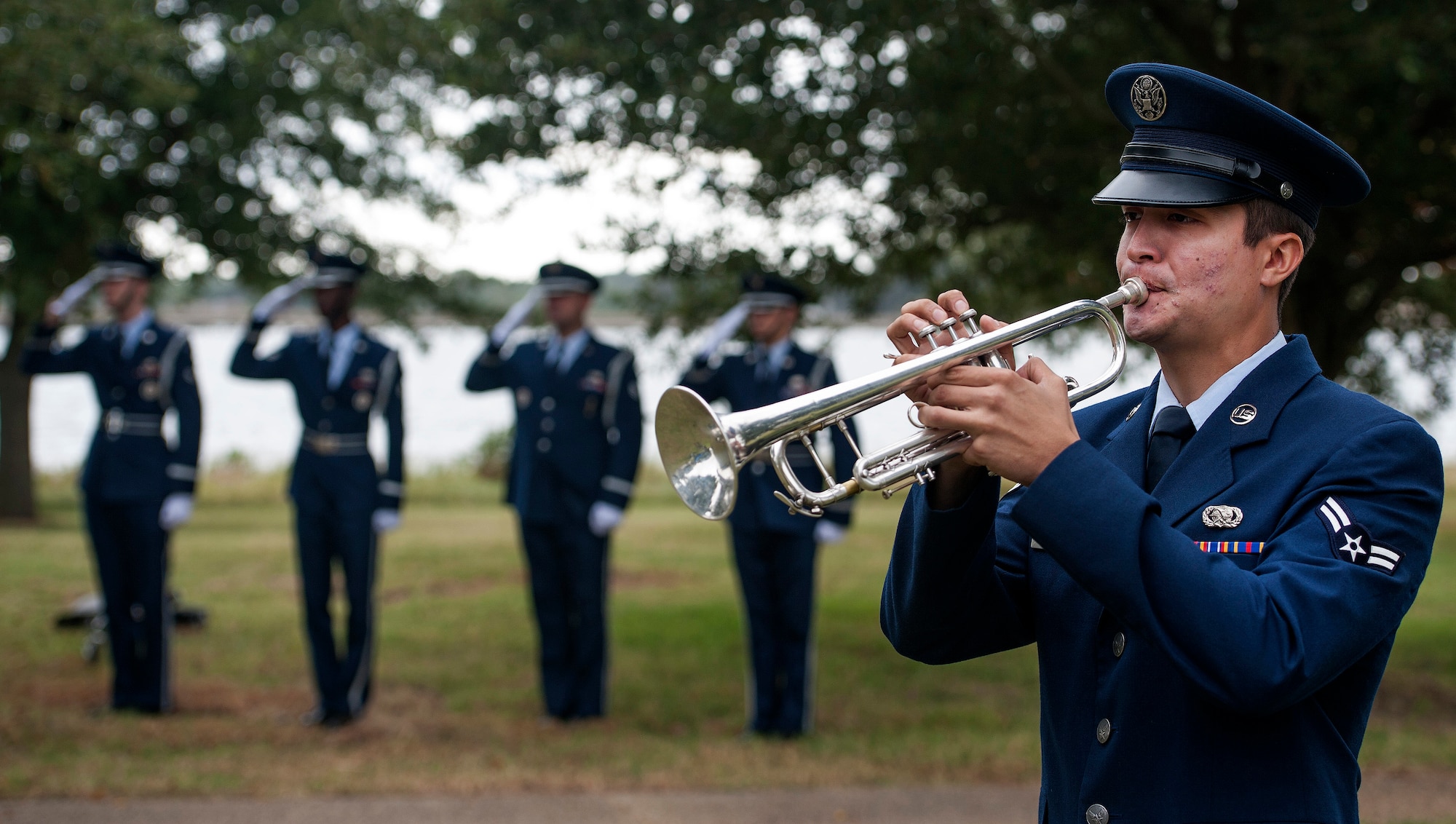 Airman 1st Class Owen Cox, the 633rd Air Base Wing Honor Guard member, plays Taps during a Prisoner of War/Missing in Action closing ceremony at Joint Base Langley-Eustis, Va., Sept. 16, 2016. Taps was created in 1932 by General Daniel Butterfield and is used in connection with military funerals, memorial events and to signify the beginning of the long last sleep at the end of a service member’s life or at the end of the duty day. (U.S. Air Force photo by Staff Sgt. Nick Wilson/Released)