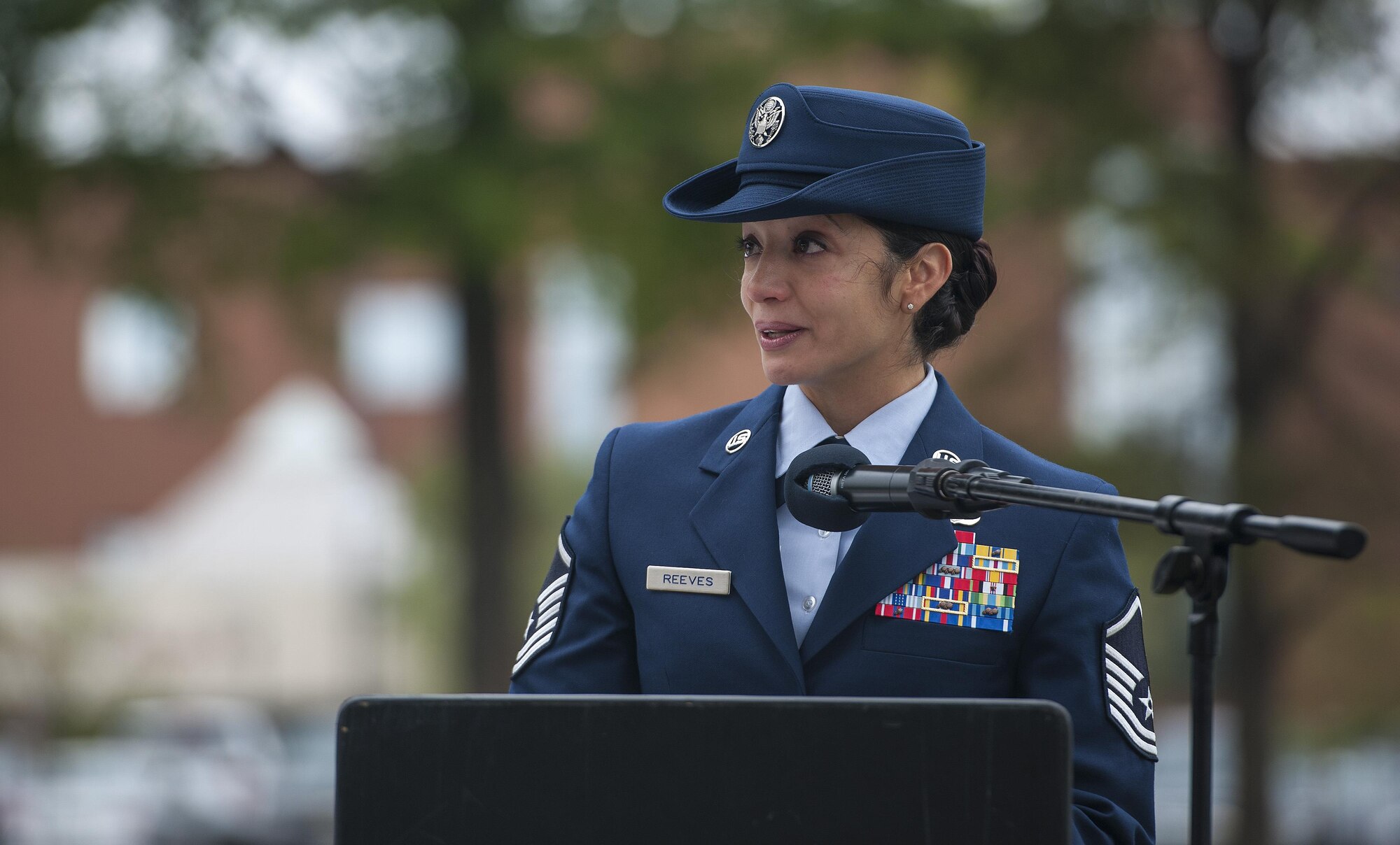 Master Sgt. Vanessa Reeves, Prisoner of War/Missing in Action committee chairman, cries during her speech at a POW/MIA closing ceremony at Joint Base Langley-Eustis, Va., Sept. 16, 2016. The ceremony was held as a remembrance event to the honor the service and sacrifice of more than 150,000 POWs who have served throughout history and more than 83, 400 Americans who are still missing today. (U.S. Air Force photo by Staff Sgt. Nick Wilson/Released)