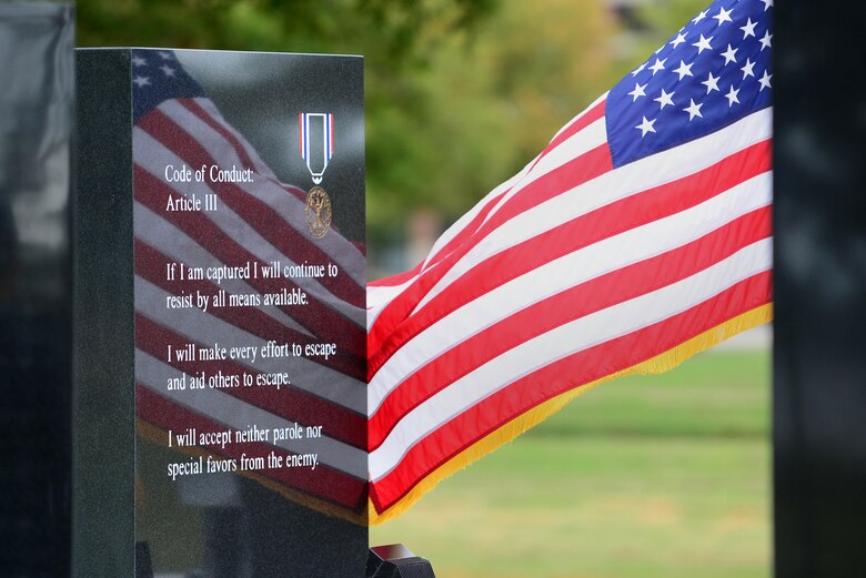The American Flag waves during the National POW/MIA Recognition Day closing ceremony at Joint Base Langley-Eustis, Va., Sept. 15, 2016. During the ceremony a former prisoner of war, U.S. Air Force retired Lt. Col Barry Bridger spoke to the crowd about his personal experiences while serving in the U.S. military. (U.S. Air Force Photo by Senior Airman Kimberly Nagle) 