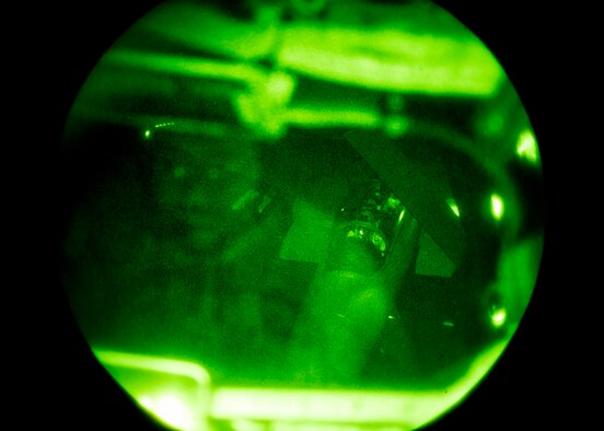 A South Korean air force F-15 maneuvers toward a refueling boom as Senior Airman Charlton Hampton, a 909th Air Refueling Squadron KC-135 Stratotanker boom operator, provides positional feedback Sept. 12, 2016, over the Pacific Ocean. Hampton trained with South Korean F-15s as part of a night time in-flight refueling exercise to help prepare for aerial operations in an austere environment. (U.S. Air Force photo/Senior Airman Peter Reft)