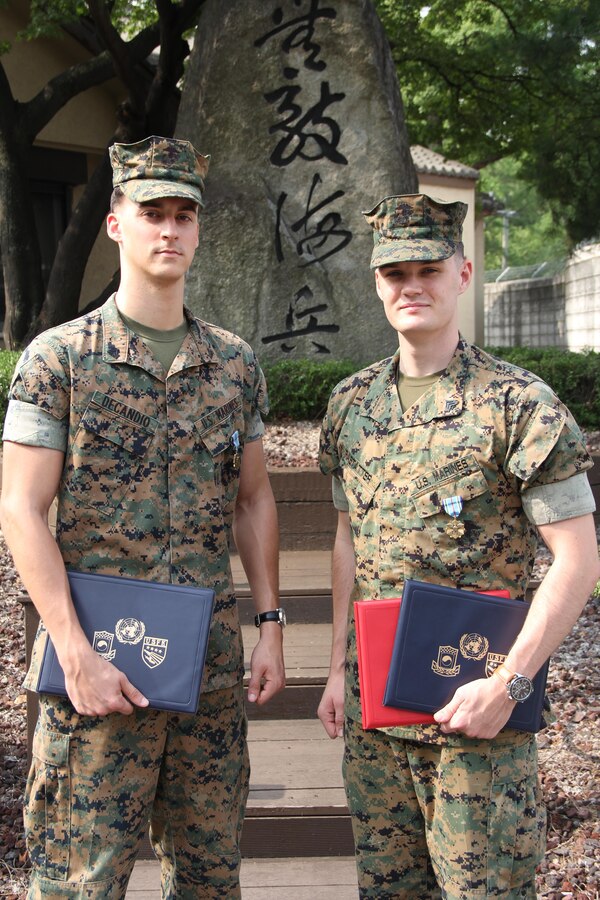 Sgt Rastatter and Cpl DeCandio presented the Joint Service Achievement Medal for serving as a Pallbearer in the Combined United Nations Command and Republic of Korea Ministry of Defense Repatriation Ceremony in April.  