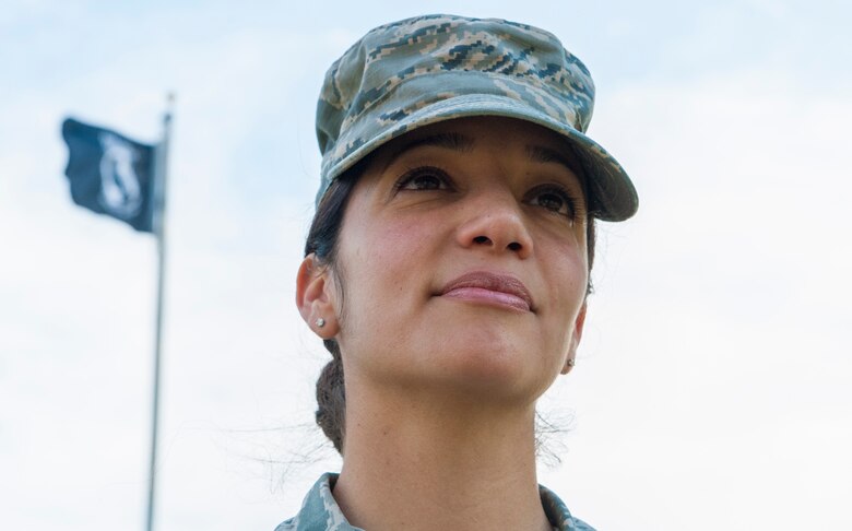 Master Sgt. Vanessa Reeves, Prisoner of War/Missing in Action committee chairman, smiles during a meeting at Memorial Grove park at Joint Base Langley-Eustis, Va., Sept. 14, 2016. She led a 12-man team over the last four months to ensure the 24 hours of POW/MIA events was successful. The events included POW/MIA opening and closing ceremonies, a 24-hour POW/MIA run and a storytelling event with a Vietnam War veteran. (U.S. Air Force photo by Staff Sgt. Nick Wilson) 