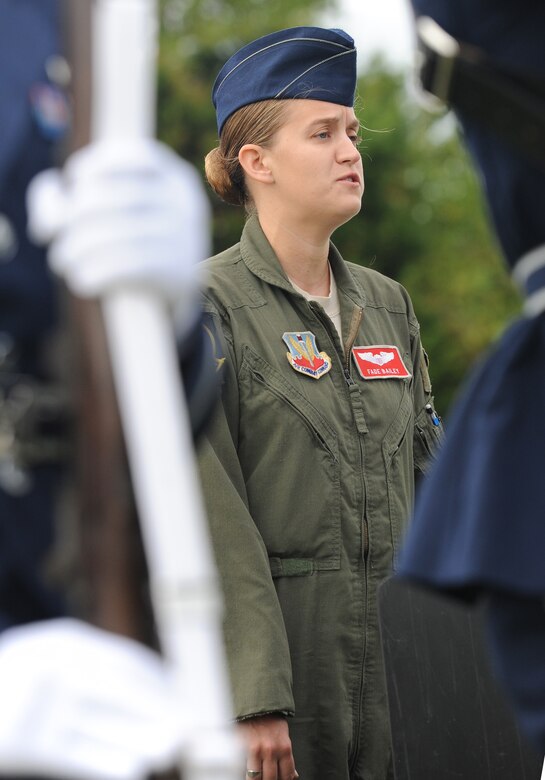 Capt. Chelsea Bailey, 71st Fighter Training Squadron flight commander, sings the Star Spangled Banner during an opening ceremony in honor of Prisoner of War/Missing in Action Recognition Day, Sept. 15, 2016. The ceremony was held in honor and remembrance of all prisoners of war and service members missing in action. (U.S.Air Force photo by Staff Sgt. Nick Wilson)