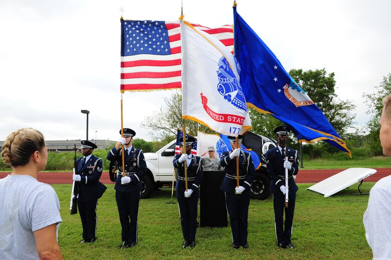 Members of the 633rd Air Base Wing Honor Guard post the colors during a Prisoner of War/Missing in Action opening ceremony at Joint Base Langley-Eustis, Va., Sept. 16, 2016. The ceremony was held in honor and remembrance of all prisoners of war and service members missing in action. (U.S. Air Force photo by Staff Sgt. Nick Wilson)