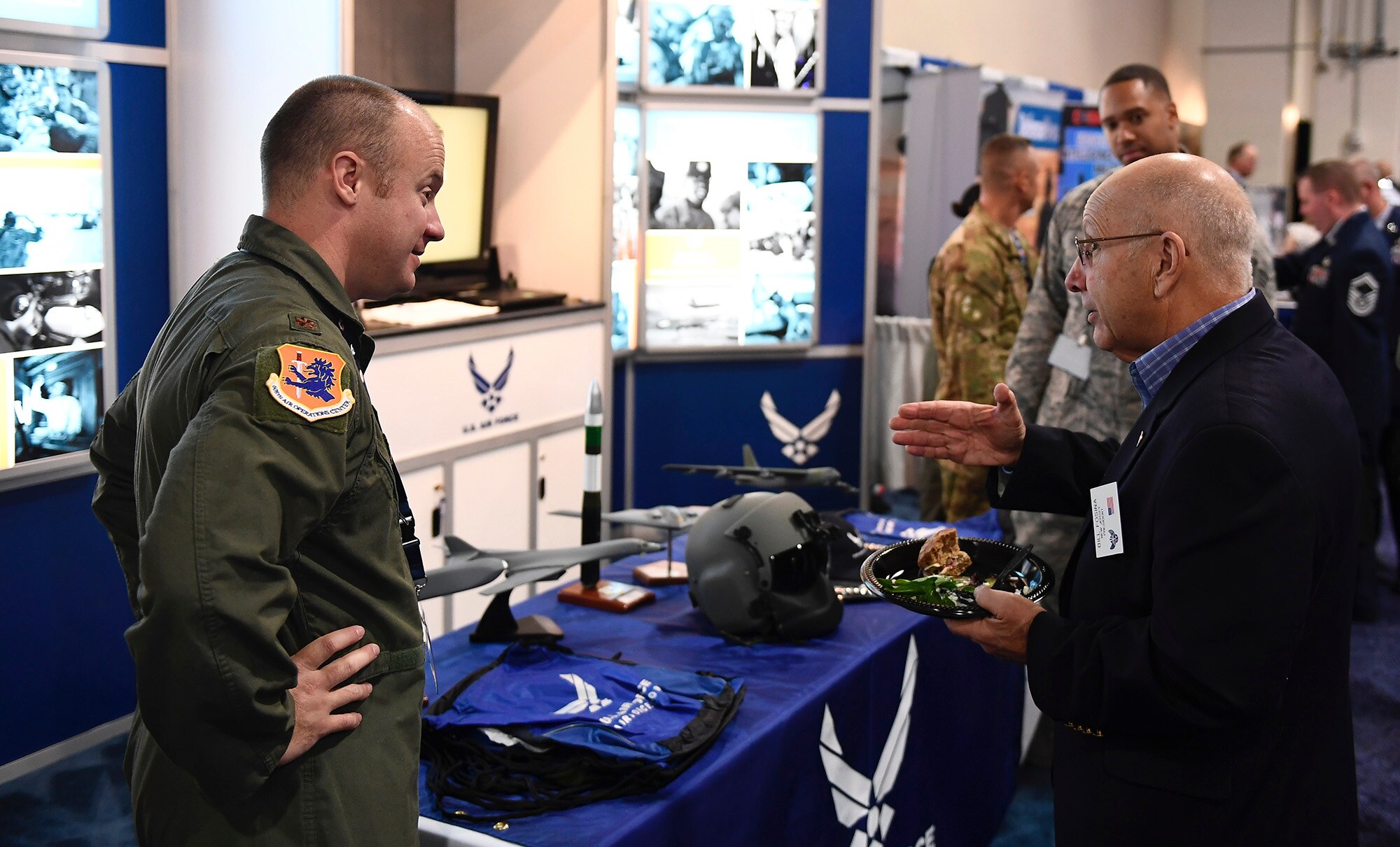 Airmen from Air Force Global Strike Command discuss their experiences and military backgrounds with those attending the Air Force Association’s Air, Space and Cyber Conference at National Harbor, Md., Sept. 19, 2016. Three major commands, AFGSC, Air Mobility Command, and Air Education and Training Command were represented at the American Airman Booth. (U.S. Air Force photo/Tech. Sgt. Bryan Franks)
