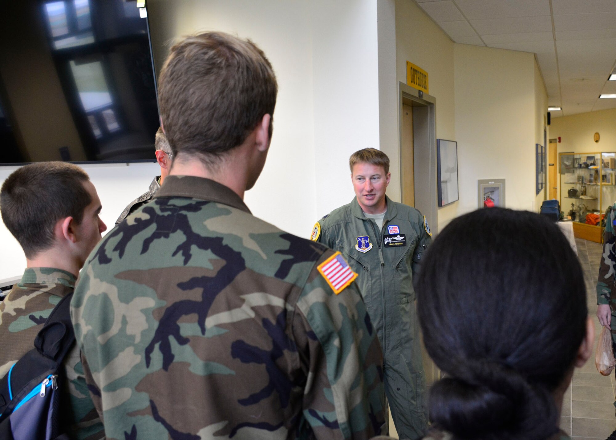 120th Airlift Wing Pilot Lt. Col. Travis Peterson answers questions posed by Civil Air Patrol cadets during a tour of the Montana Air National Guard base Sept. 13, 2016. The cadets are assigned to the Malmstrom Air Force Base Composite Squadron of the Civil Air Patrol Montana Wing and were taking a C-130 Hercules orientation flight Sept. 13, 2016. (U.S. Air National Guard photo by Senior Master Sgt. Eric Peterson)