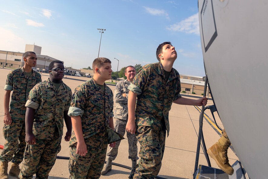 Cadets with the Richwoods High School Marine Corps Junior ROTC program board a C-130 Hercules for an orientation flight at the 182nd Airlift Wing in Peoria, Ill., Sept. 15, 2016. The cadets visited the installation to learn about the Air National Guard and its mission capabilities as part of the JROTC orientation event. (U.S. Air National Guard photo by Staff Sgt. Lealan Buehrer)