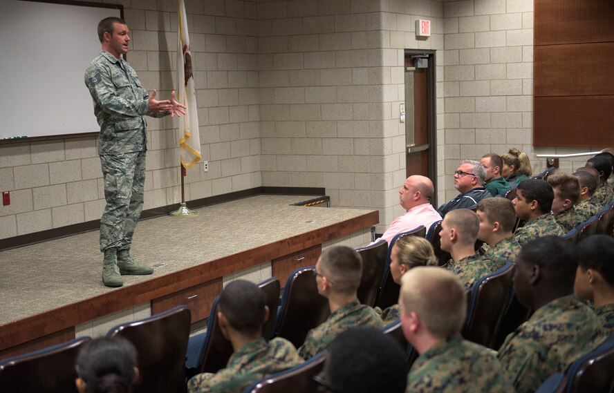 U.S. Air Force Tech. Sgt. Darrin Kesler, a recruiter with the 182nd Force Support Squadron, Illinois Air National Guard, speaks to Richwoods High School Marine Corps Junior ROTC cadets about benefits the ANG offers in Peoria, Ill., Sept. 15, 2016. The cadets visited the installation to learn about the ANG and its mission capabilities as part of the JROTC orientation event. (U.S. Air National Guard photo by Staff Sgt. Lealan Buehrer)