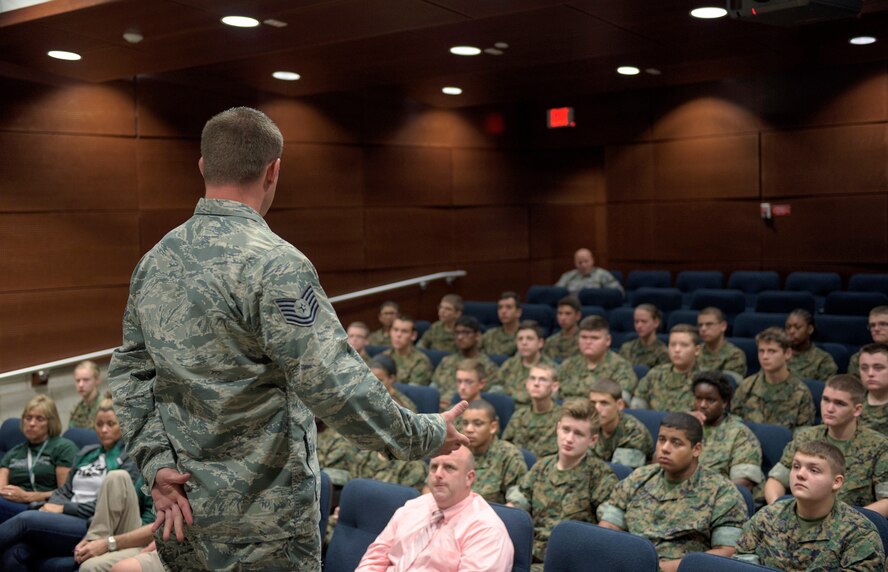 U.S. Air Force Tech. Sgt. Darrin Kesler, a recruiter with the 182nd Force Support Squadron, Illinois Air National Guard, speaks to Richwoods High School Marine Corps Junior ROTC cadets about benefits the ANG offers in Peoria, Ill., Sept. 15, 2016. The cadets visited the installation to learn about the ANG and its mission capabilities as part of the JROTC orientation event. (U.S. Air National Guard photo by Staff Sgt. Lealan Buehrer)