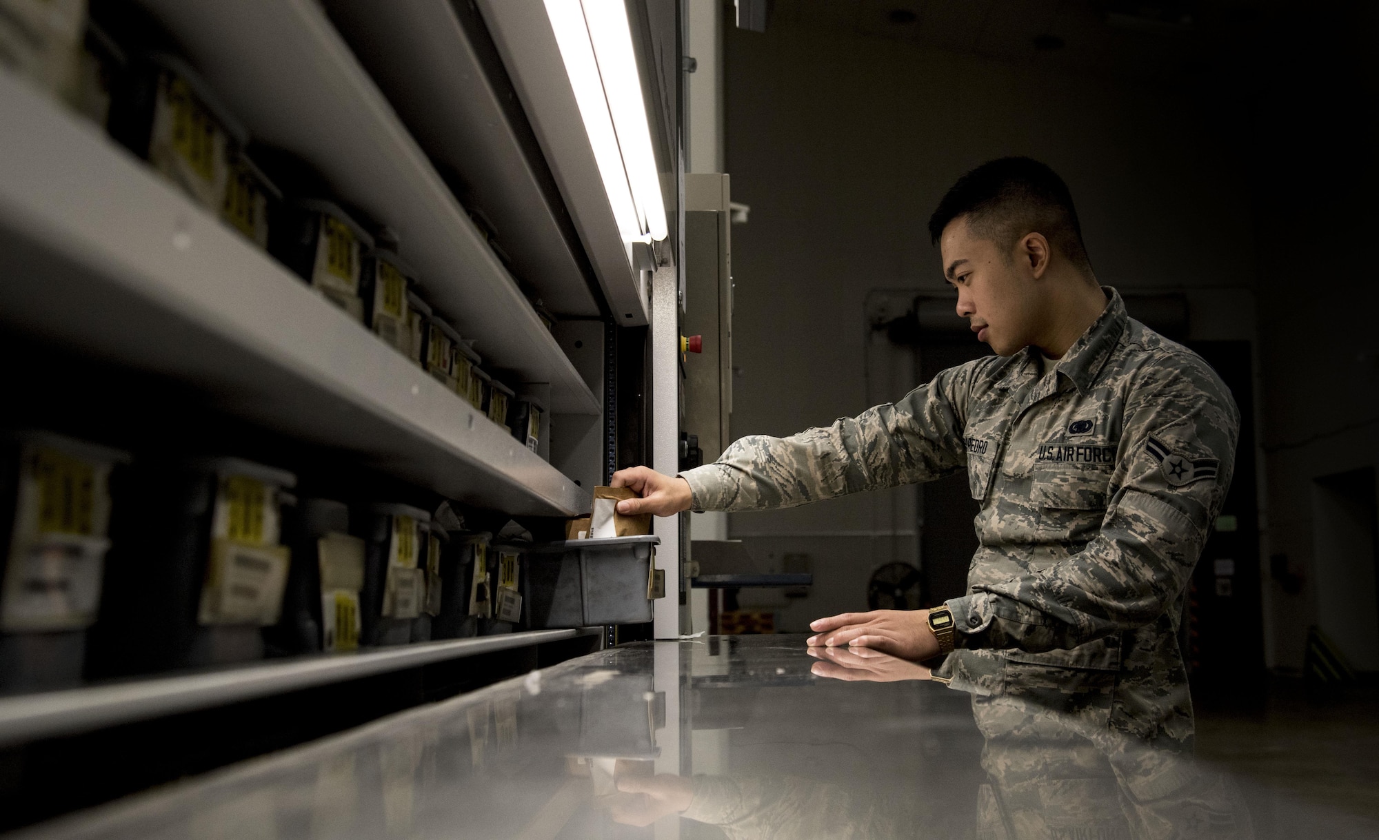 U.S. Air Force Airman 1st Class Samuel San Pedro, an aircraft parts store apprentice with the 35th Logistics Readiness Squadron, inspects a bin of electric bushings at Misawa Air Base, Japan, Sept. 20, 2016. Inventory is conducted monthly to ensure all aircraft items are serviceable. (U.S. Air Force photo by Airman 1st Class Sadie Colbert)