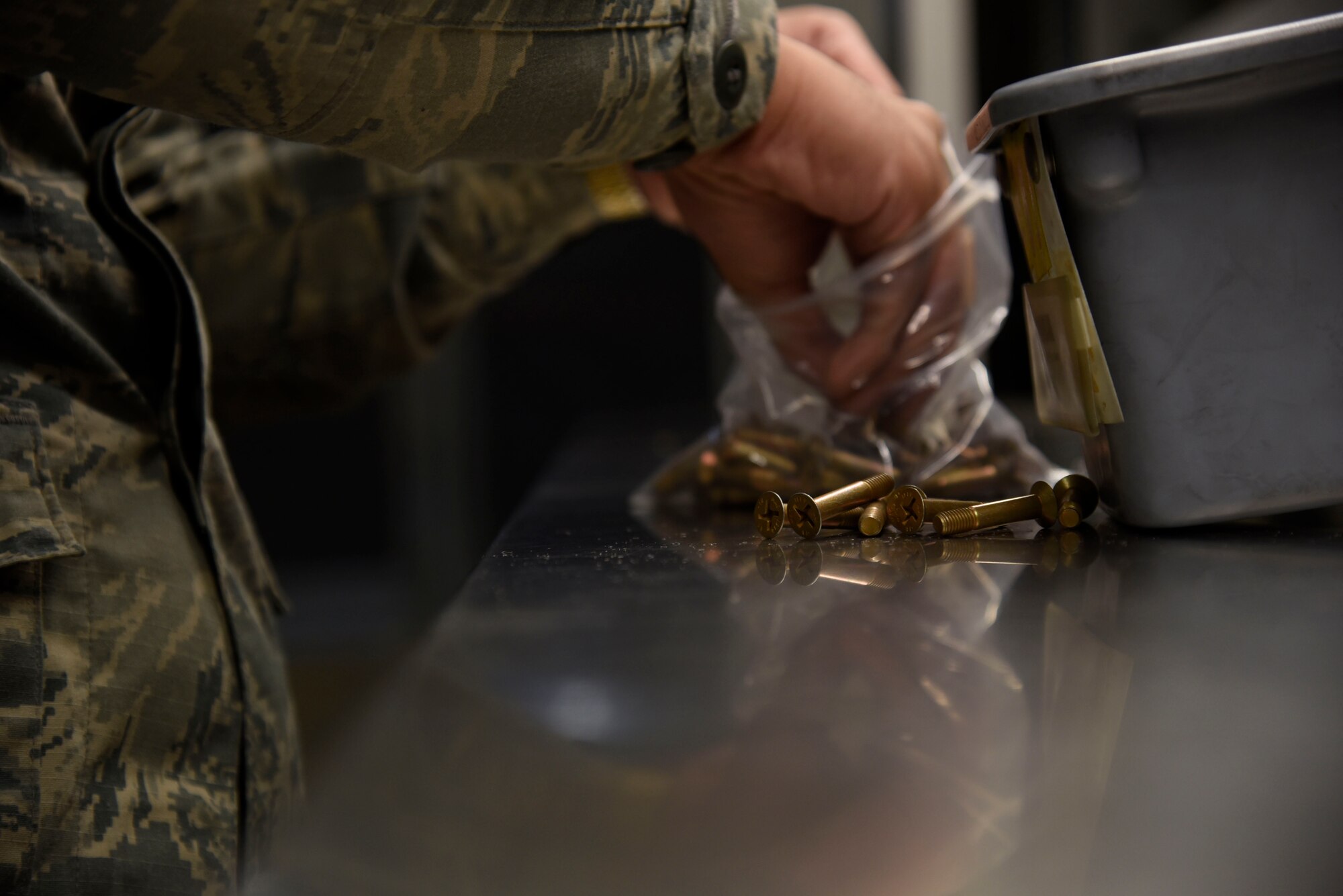 U.S. Air Force Airman 1st Class Samuel San Pedro, an aircraft parts store apprentice with the 35th Logistics Readiness Squadron, inventories aircraft screws at Misawa Air Base, Japan, Sept. 20, 2016. All assets are inventoried to keep track of how many parts are on hand and to ensure none have been misplaced. (U.S. Air force photo by Airman 1st Class Sadie Colbert)